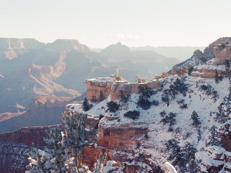 An aerial view of the Grand Canyon covered by snow