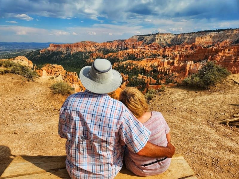 Couple On Tour Overlooking Bryce Canyon