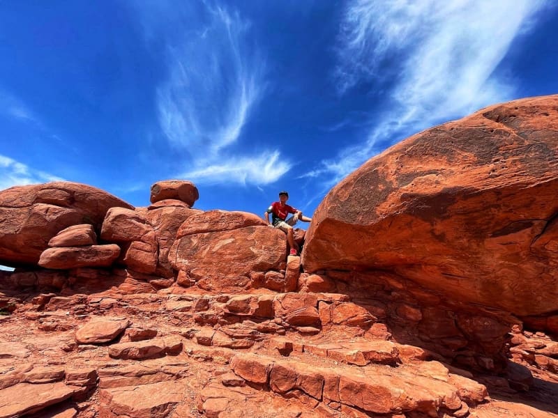 Man Climbing Rocks at the Grand Canyon
