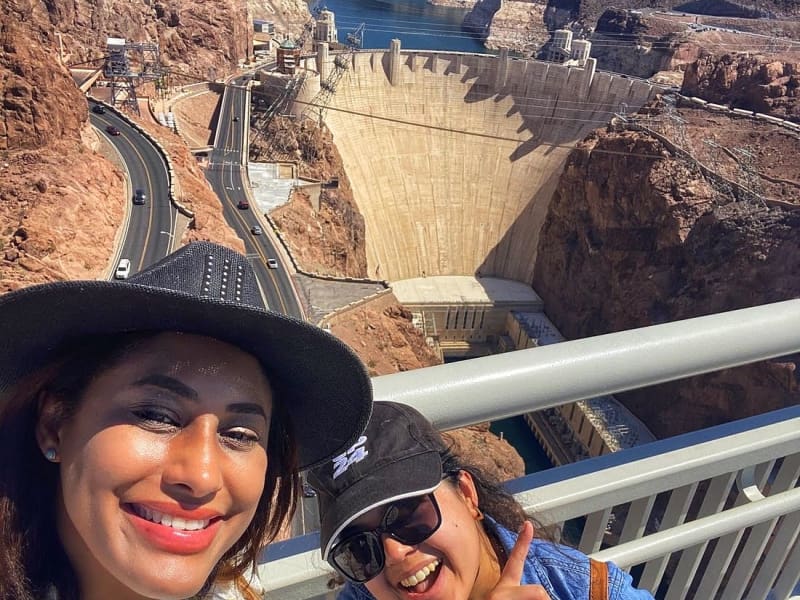 Two Ladies Posing in front of the Hoover Dam