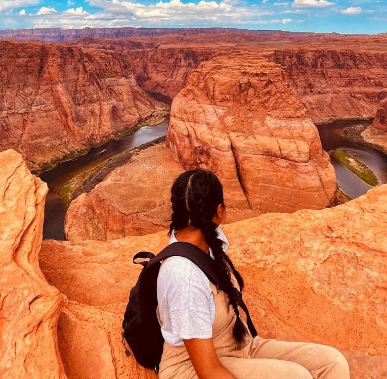Lady With Backpack overlooking Horseshoe Bend